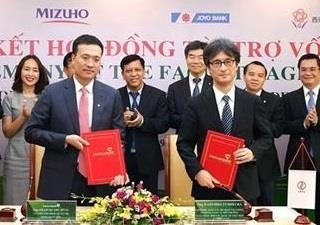 Vietcombank, JBIC trao doi van kien tin dung du an nang luong tai tao hinh anh