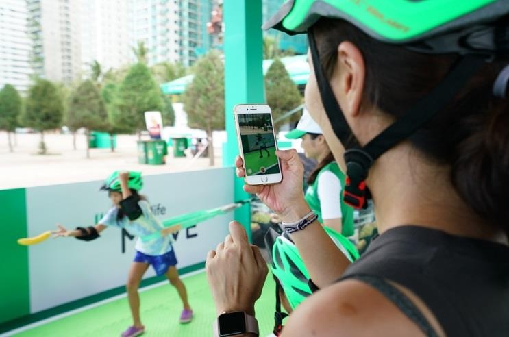 Nguoi dan Da Nang thich thu huong ung 'lan song van dong' hinh anh