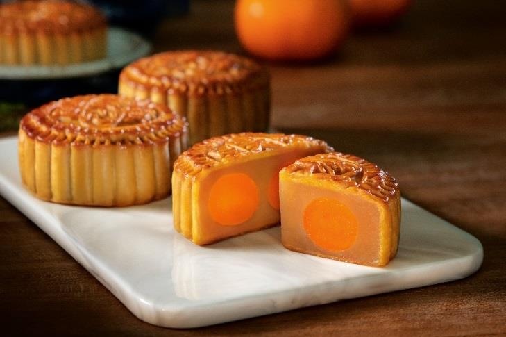 Vi sao banh trung thu xu cang thom hap dan thuc khach Viet? hinh anh