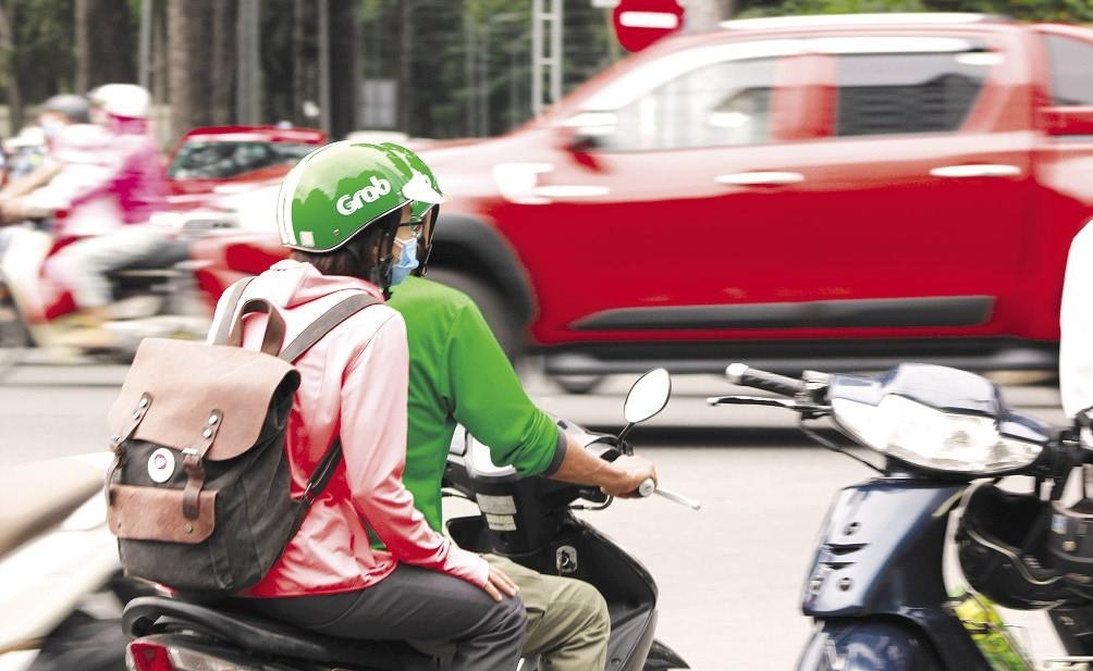 Dinh huong thanh ‘sieu ung dung’, Grab da chuyen minh the nao? hinh anh