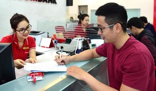 Dau tu vao chat luong giao dich, ngan hang tang truong manh hinh anh