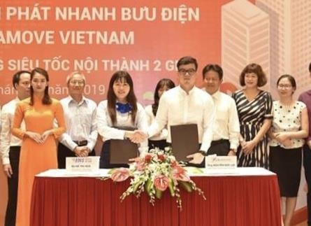 EMS bat tay Lalamove cung cap dich vu giao hang noi thanh trong 2 gio hinh anh