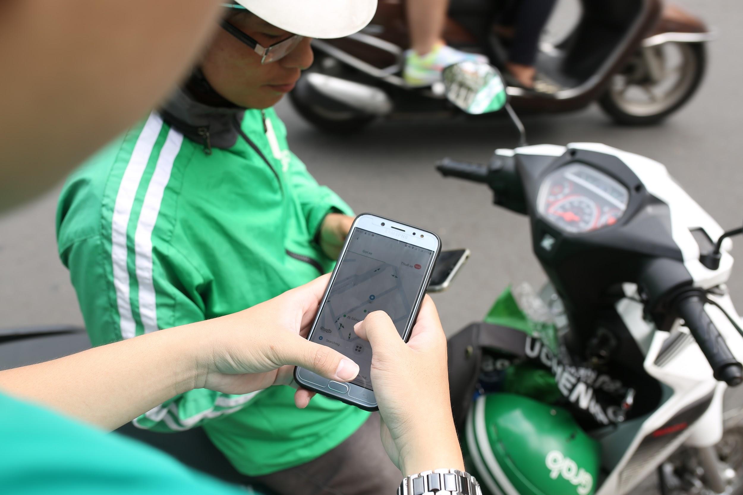 Phi xe cho qua 5 phut cua Grab se duoc chuyen toan bo cho tai xe hinh anh