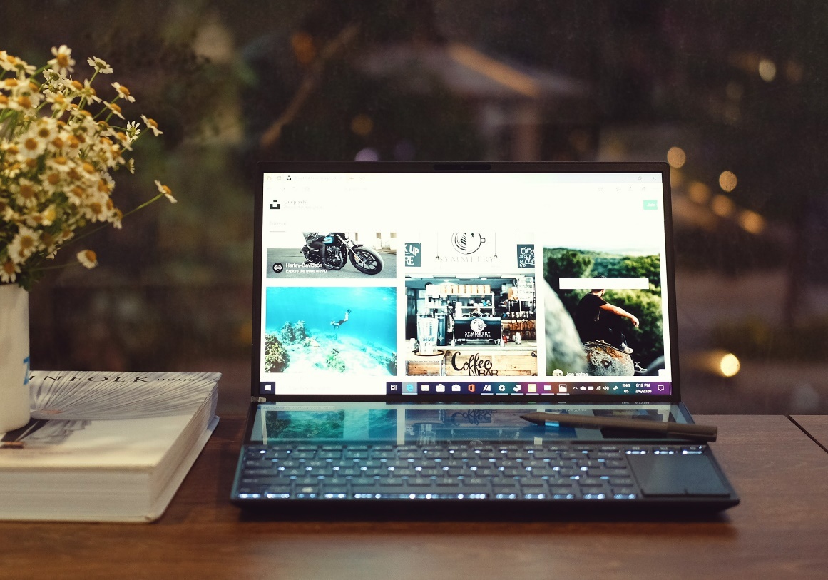 Laptop sang tao noi dung Asus ZenBook Duo anh 1