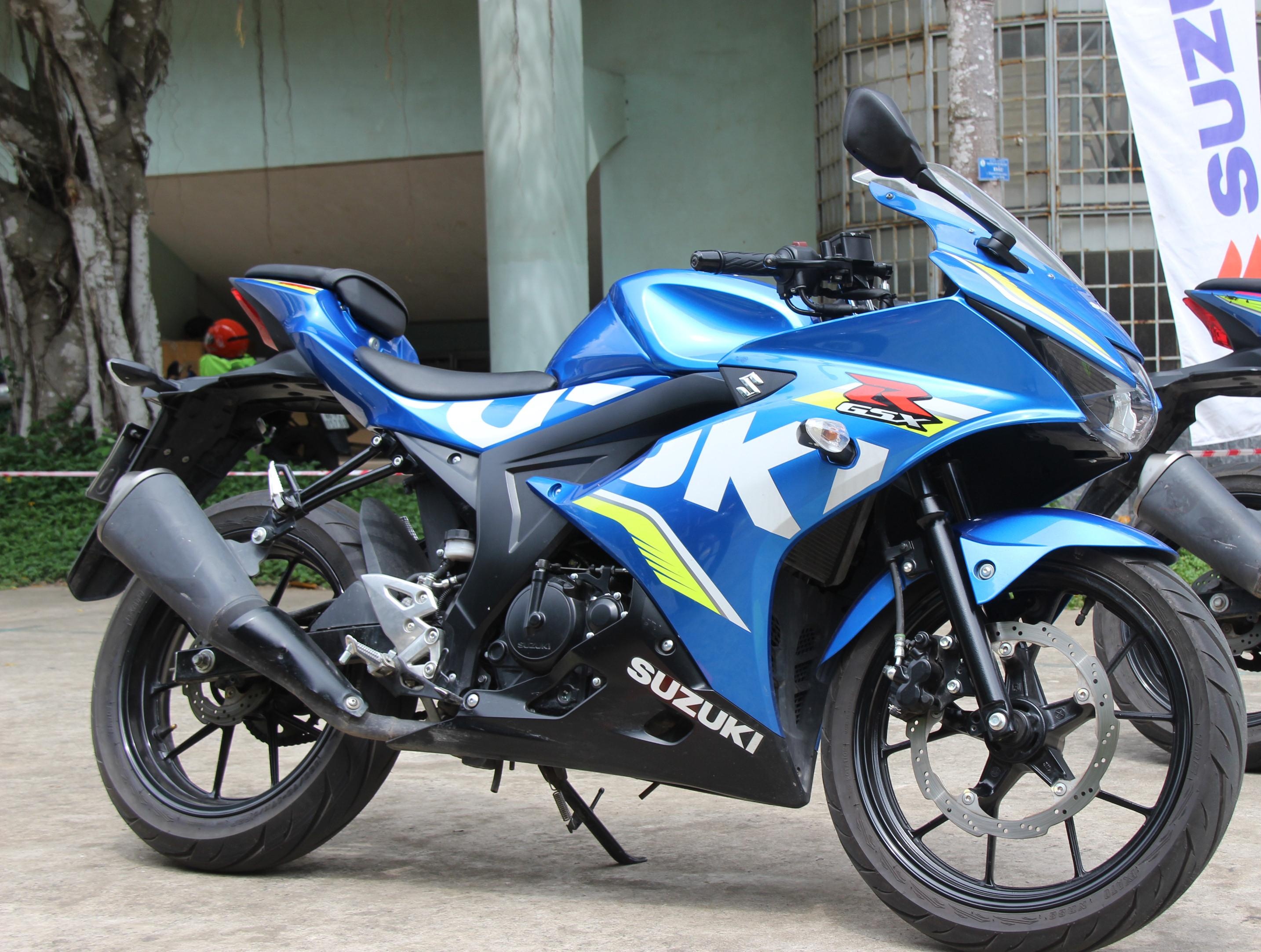 Suzuki ho tro phi truoc ba cho khach mua xe moi hinh anh