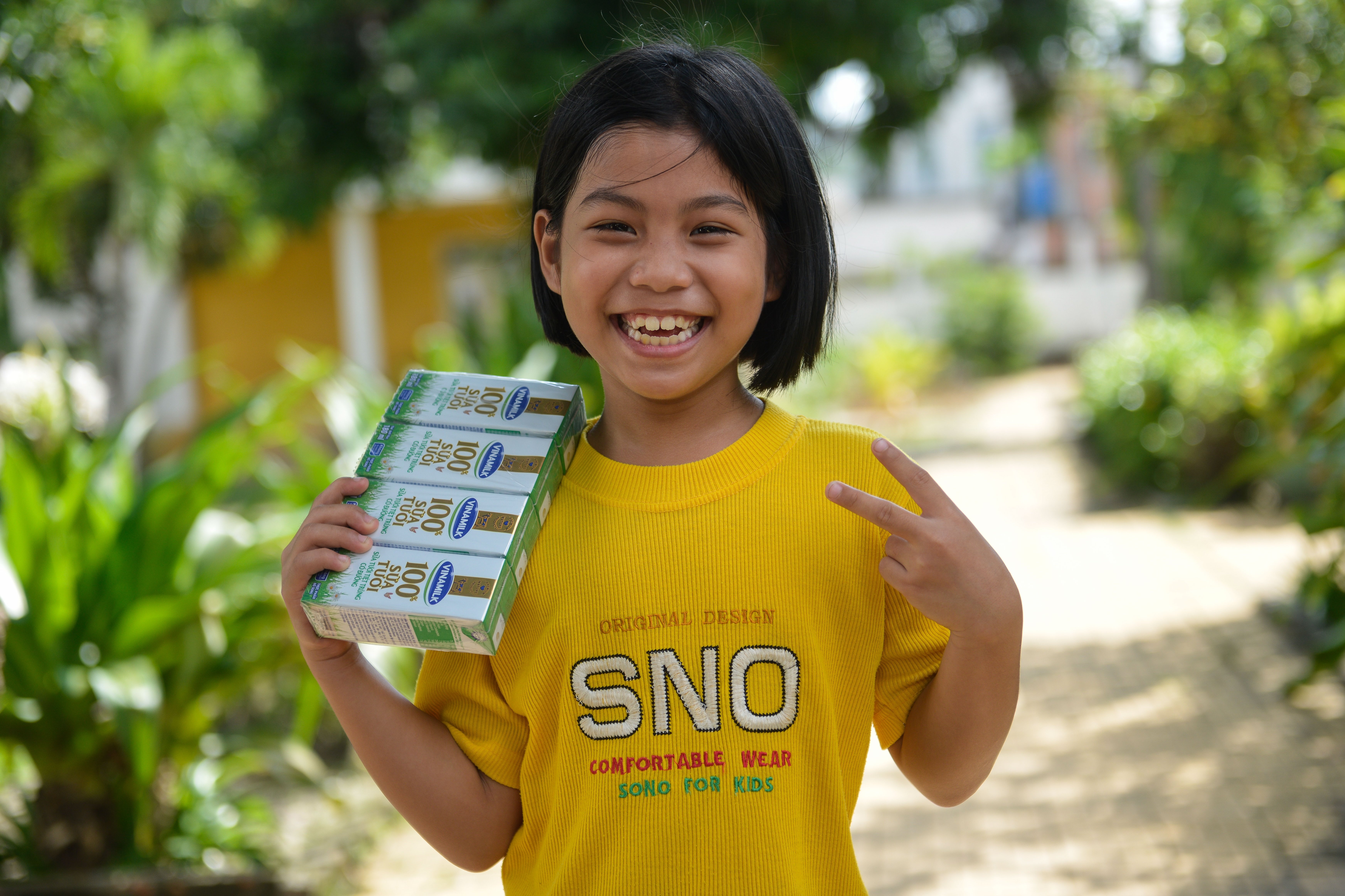 13 nam mang sua den voi tre em - hanh trinh cho di cung la nhan lai hinh anh