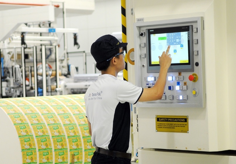 Doanh nghiep no luc xanh hoa san xuat giay bao bi hinh anh