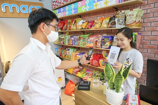 Tiem tap hoa chuyen minh giua thoi cong nghe so hinh anh