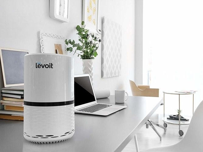 Tang cuong suc khoe thoi dich bang may loc khong khi hinh anh