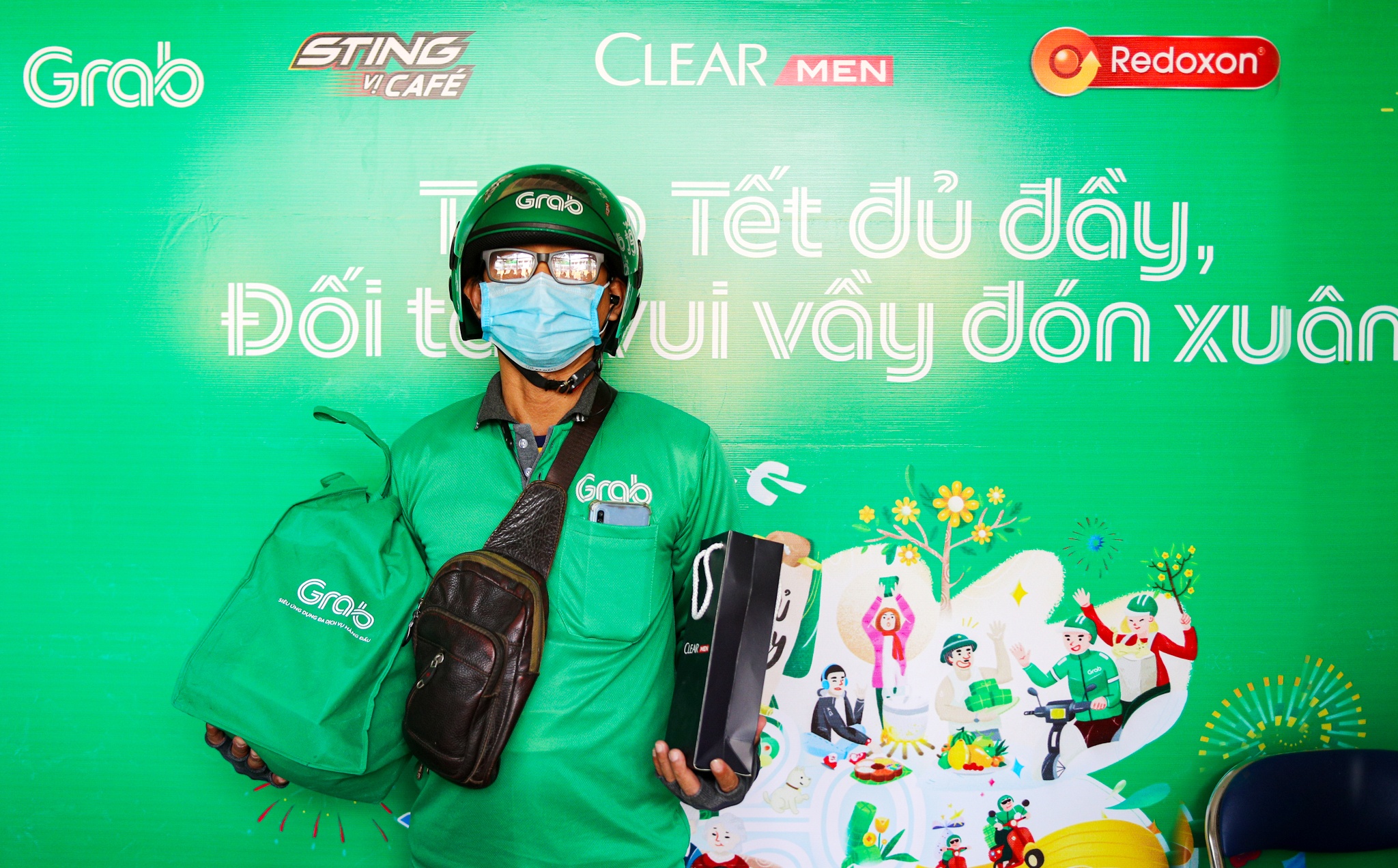 Doi tac xuc dong don ‘Tet du day’ cung Grab hinh anh