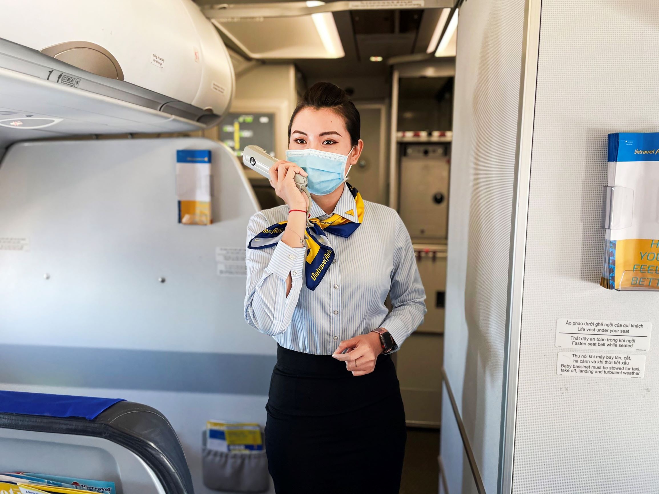 Vietravel Airlines,  huong dan vien tren tau bay anh 2