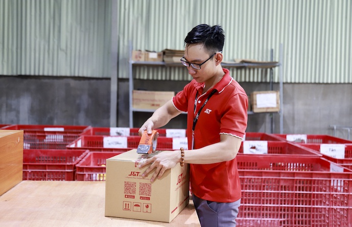 J&T Express mo tuyen gui hang di Malaysia hinh anh