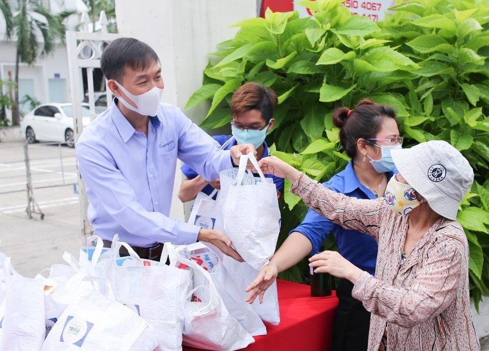 Trien khai 'Trieu bua com' tai cac tinh thanh anh huong boi Covid-19 hinh anh