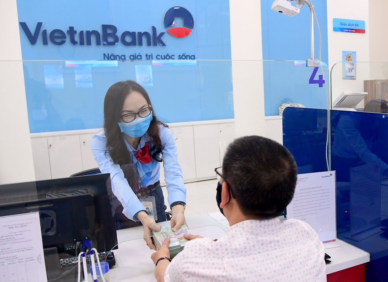 Nguoi dung VietinBank co the nop, rut tien tai cac buu cuc VNPost hinh anh