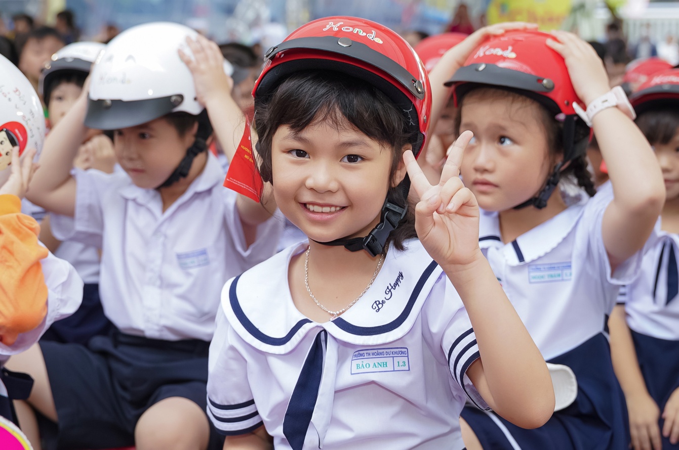 Honda dong gop tich cuc vao ty le 89% hoc sinh doi mu bao hiem hinh anh