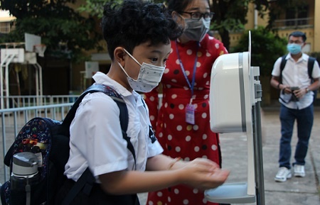 F1 la hoc sinh tieu hoc cach ly tai nha 7 ngay neu chua mac Covid-19 hinh anh