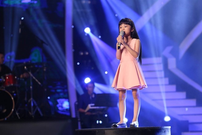 Be Minh Thu trinh bay ca khuc 'Thanh thi' hinh anh