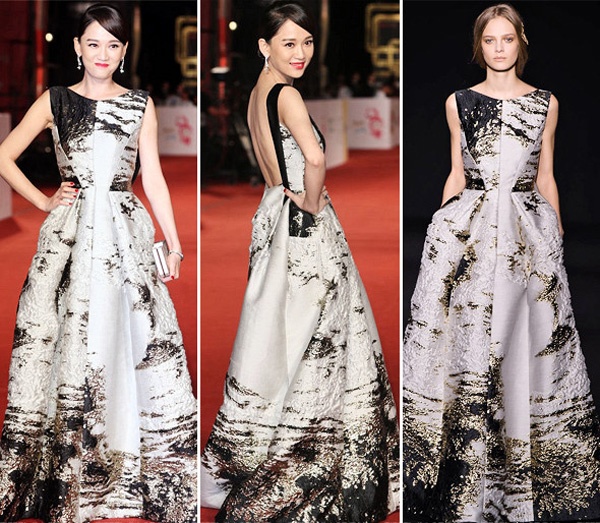 Người đẹp xứ Đài Trần Kiều Ân nổi bật trên thảm đỏ. Cô chọn cho mình set đồ hoàn hảo với váy nằm trong bộ sưu tập thu đông 2014 hiệu Alberta Ferretti kết hợp bông tai, ví cầm tay sáng lung linh.