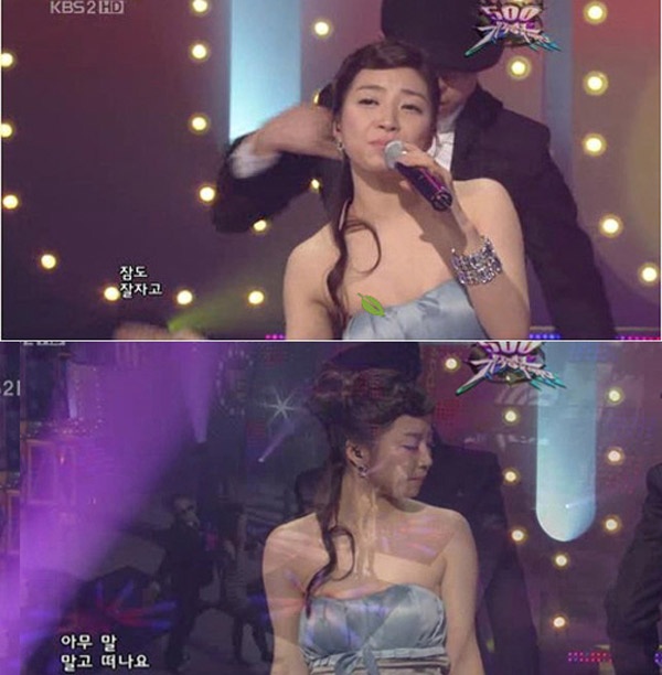 Một thành viên trong bộ ba Brand New Day vẫn mải mê hát khi áo quây của cô bị tụt xuống, làm lộ miếng dán ngực.