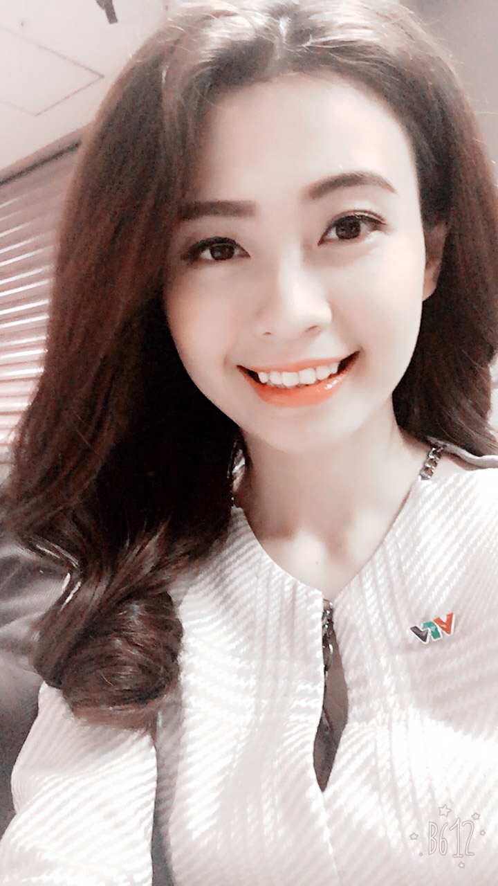 bien tap vien Huong Lien du bao thoi tiet anh 1