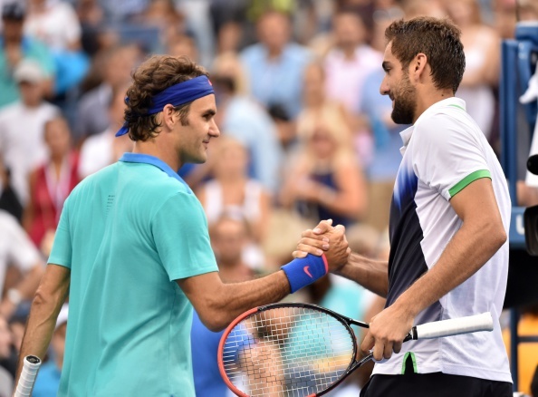 Federer bat ngo guc nga truoc Cilic tai ban ket US Open 2014 hinh anh