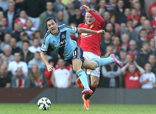 Fan M.U keu goi tuoc bang doi truong cua Rooney hinh anh