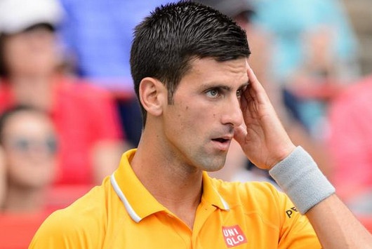 Djokovic chong mat vi hit phai mui can sa hinh anh