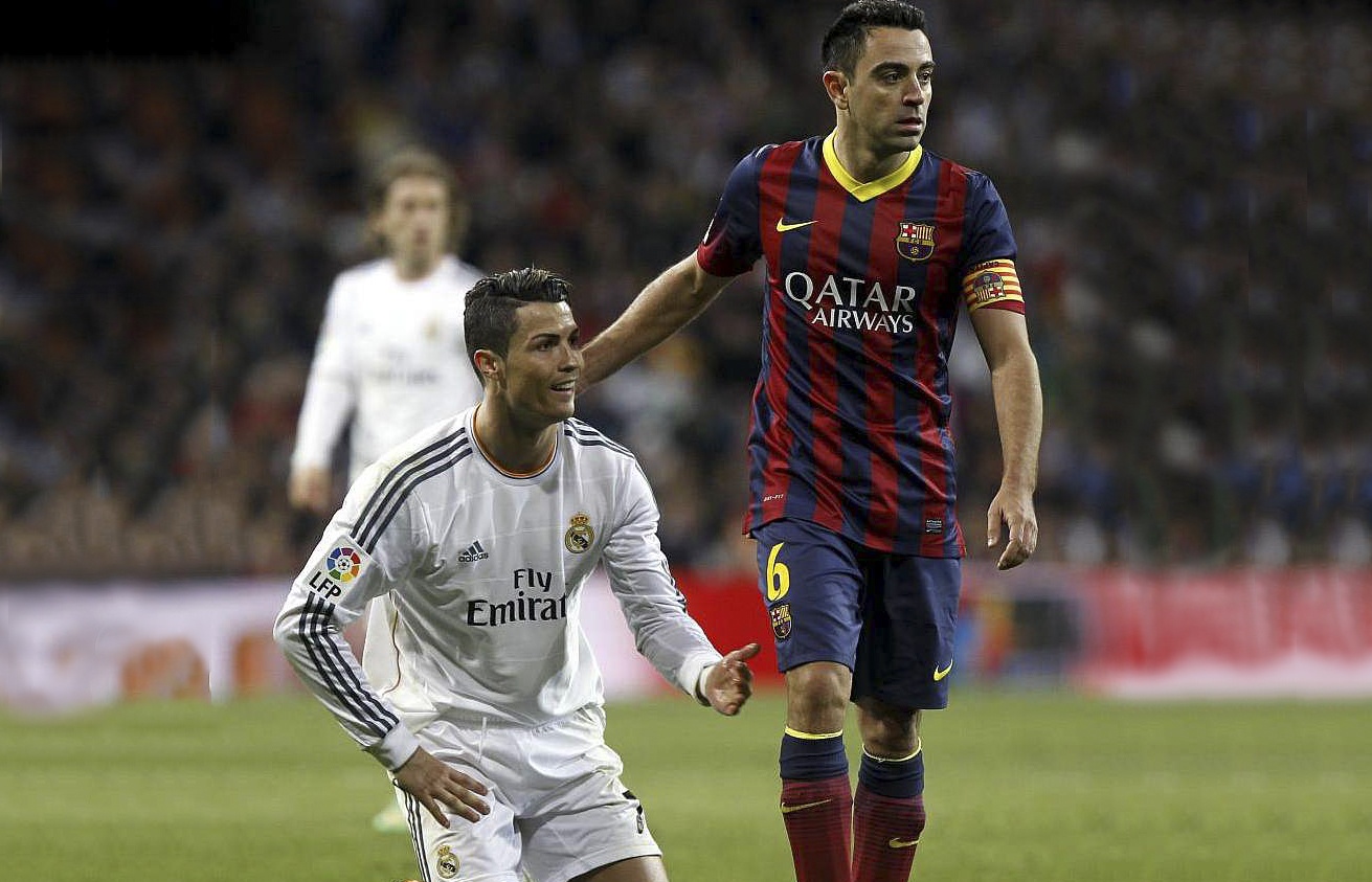 Xavi soc truoc thong tin Ronaldo tron thue hinh anh