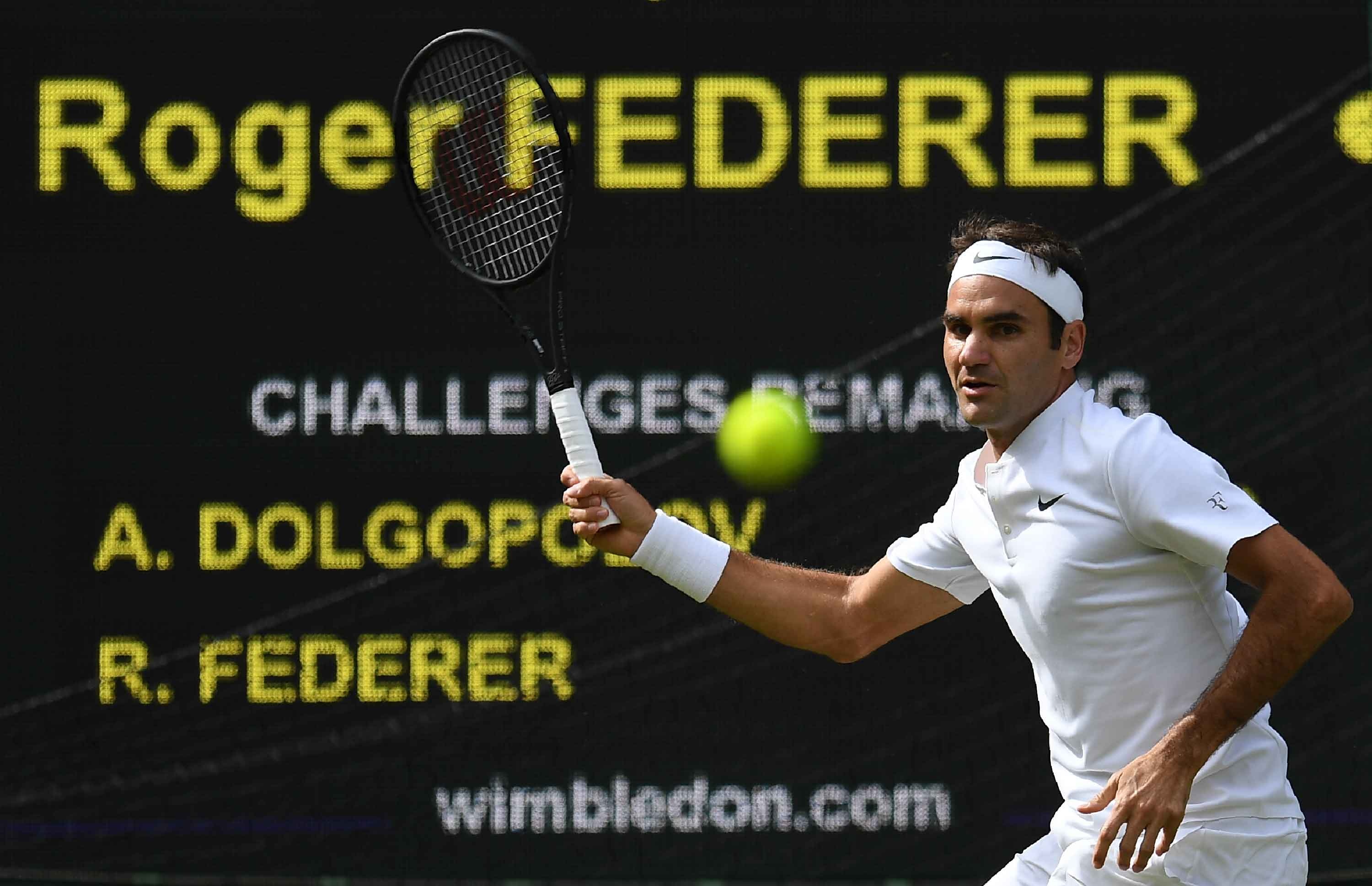 Su trung hop ky la giua Federer va Djokovic o tran ra quan hinh anh