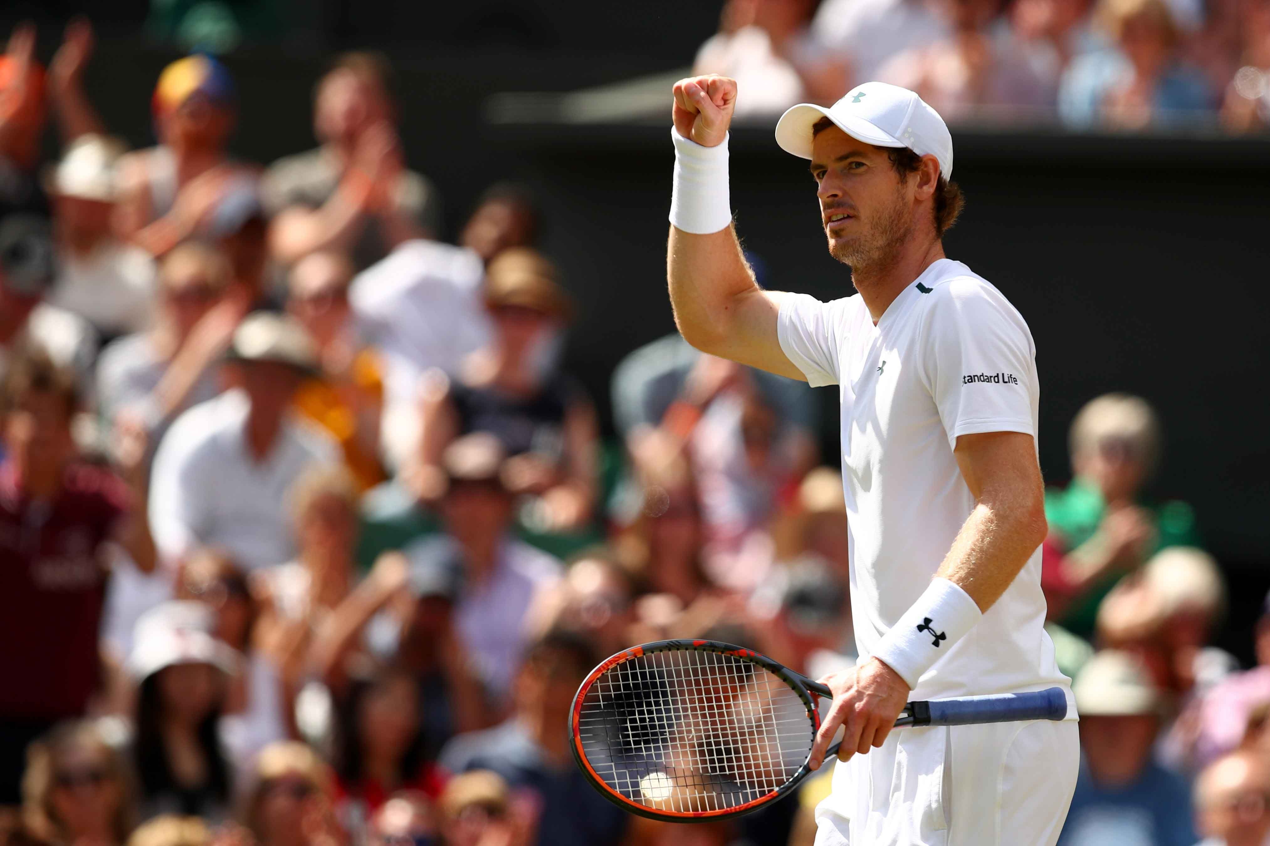 Murray chia tay Wimbledon anh 2