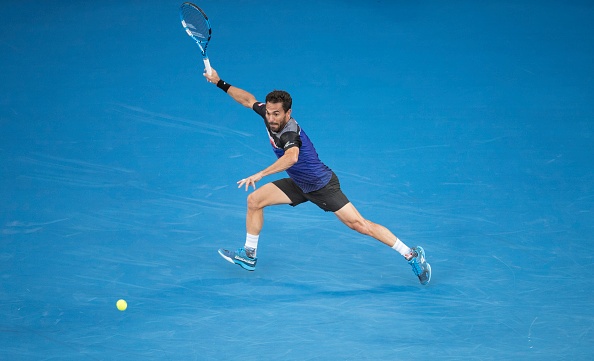 Nadal tro lai phong cach ao ba lo anh 4