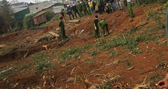 Phat hien xac phu nu bi troi vui lap trong rac hinh anh