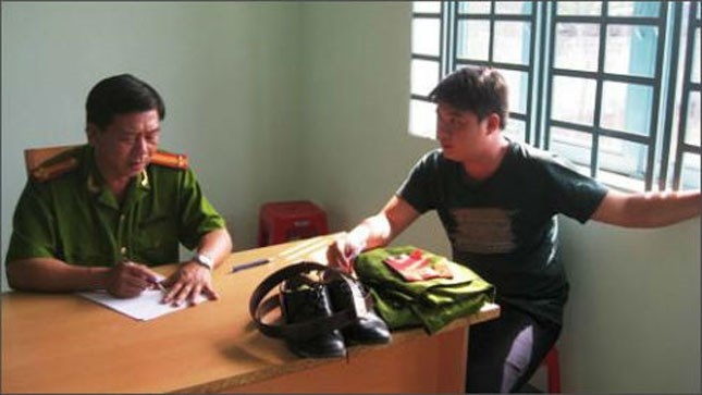 Cong an rom doa bat ca... thieu ta cong an that hinh anh