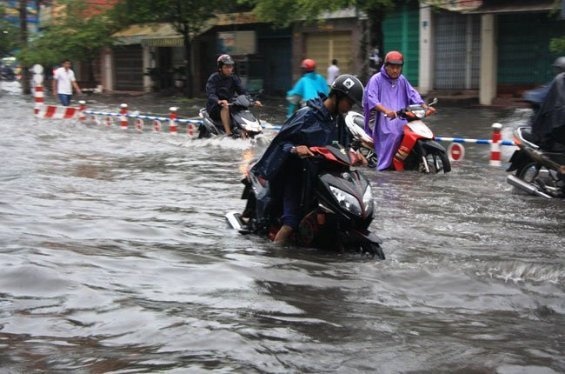 Lam ho ngam chua nuoc chong ngap o TP.HCM hinh anh