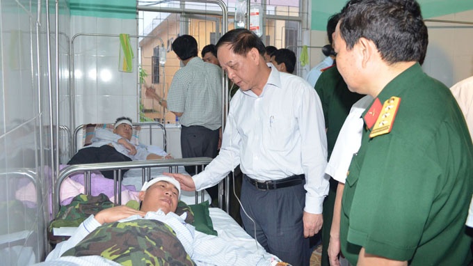 Trao tra 11 nguoi nhap canh trai phep cho Trung Quoc hinh anh