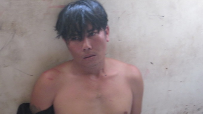 Đối tượng Nguyễn Văn Nhuận tại cơ quan công an.