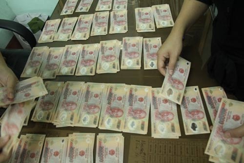 Bat ke chu muu mua ban mot ty dong tien gia hinh anh