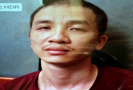 Tuấn tại cơ quan công an.