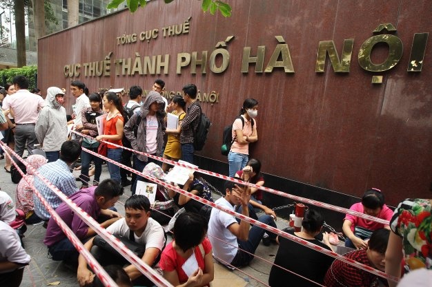 Ha Noi cho cong chuc nghi viec: Khong den 10.000 nguoi hinh anh