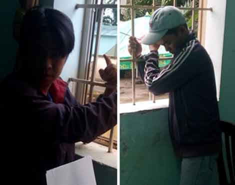 Hai nghi can trộm chó bị công an tạm giữ.