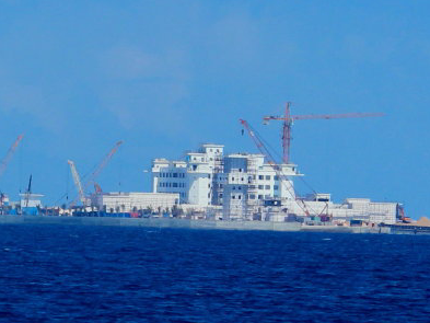 Trung Quoc xay cong trinh 9 tang tren dao Huy Go hinh anh