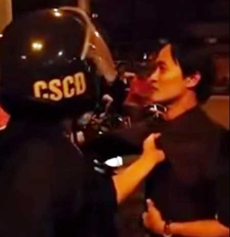 Canh sat co dong tum co ao dan hinh anh