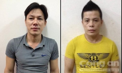 Hai bị can tại cơ quan công an.