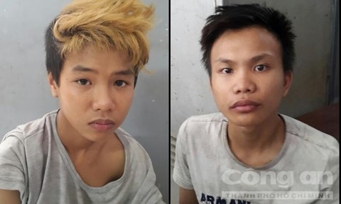 Thạch và Huy tại cơ quan công an.