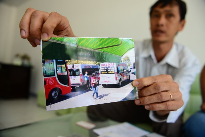 Đại diện Công ty TNHH vận tải Toàn Thắng đưa bức ảnh ghi nhận các xe giả mạo xe của công ty để hoạt động.