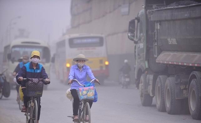 Canh bao suong mu quang hoa dang 'bua vay' Ha Noi va Sai Gon hinh anh