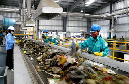 3,5% chi ngan sach cua Ha Noi, TP.HCM la thu gom, xu ly rac hinh anh