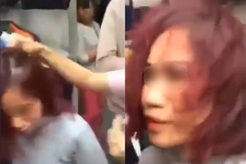 Co gai bi vay danh vi trom iPhone anh 1