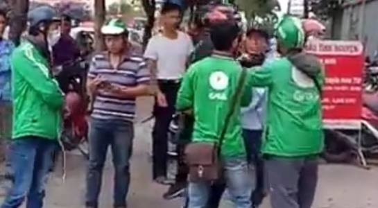 Tai xe GrabBike hon chien o ben xe Mien Tay, canh sat no sung tran ap hinh anh