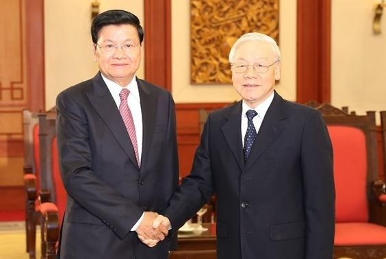 Tong bi thu, Chu tich nuoc tiep Thu tuong Lao Thongloun Sisoulith hinh anh